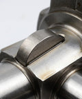 Close-up of a half moon Woodruff key in a shaft from the 164-Piece Metric Woodruff Key Set for Bike and Engine Maintenance Carbon Steel Half Moon Parallel Shaft Keys 2 to 10mm Keyway Repair Kit Durable Gearhead Must-Have Essential for Motors and Flywheels.