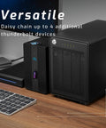 ThunderBay 4 8TB External Storage Dock Featuring Blazing Thunderbolt Link positioned near a keyboard and other devices.