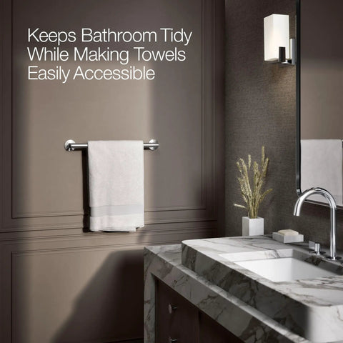 18-Inch Towel Bar In Polished Chrome, Slick Modern Bathroom Accessory With Premium Metal Build, Tarnish Resistant Finish, Coordinates With Components Faucets And Trim For A Sharp, Everyday Look on bathroom wall with white towel