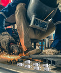 Worker using grinder with 8 Piece Butt Welding Clamps Set For Edge To Edge Welds And Patch Repairs On Auto Body Panels foreground