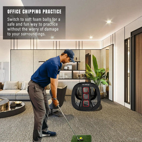 Man practicing with Ultimate Pop Up Golf Chipping Net Set For Portable Practice On The Go in an office space