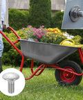 Heavy Duty 20 Pack M8 X 20mm Square Neck Carriage Bolts Crafted From Premium 304 Stainless Steel For Rock Solid Auto Garage Upgrades Built Different To Take On Tough Job Site Demands Without Breaking A Sweat in use with a wheelbarrow.