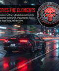 Four Pack Red Metal Skull Wheel Center Hub Cap Stickers Self Adhesive Waterproof Rim Covers Rugged Fits Trailer Grease And Bearing Dust Caps Straight Up Tough on a car in rain.