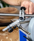 SVD-186 R Gouge Jig For Sharpening Woodturning And Woodworking Tools in use, showing metal components and adjustment knobs