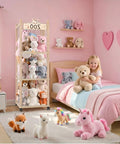 56 Inch Tall Wooden Stuffed Animal Storage Tower With Wheels in a pink bedroom, organizing plush toys for nursery or playroom.
