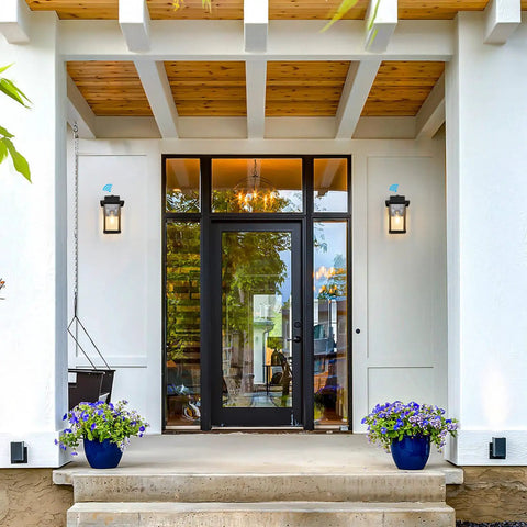 Front view of a porch with Large 14 Inch Outdoor Wall Lantern With Wood Grain Finish And Clear Glass Anti Rust Exterior Sconce
