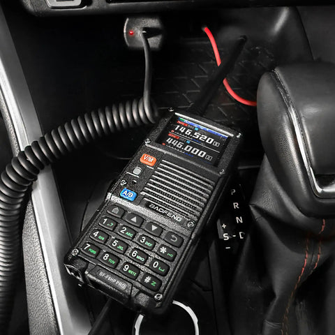 Battery Eliminator For BF-F8HP Pro And Other Handheld Radios From 12V To 24V DC in vehicle setup with radio connected.