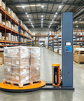 Built Like A Tank Automatic Pallet Wrapper With Plc Touchscreen Panel and Heavy Duty Welded Steel Frame in warehouse.