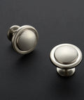 Brushed Nickel Cabinet Pulls 1-1/4 Inch Modern Disc Knobs for Kitchen Cabinets and Dressers, set on dark surface.