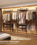Wall Mounted Garment Rack With Four Expandable Rods And Eight Adjustable Shelves, black metal, installed in walk-in closet