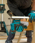 Man using 18V LXT Brushless Cordless Barrel Grip Jig Saw Tool Only With Variable Speed 800 To 3,000 SPM For Precise Cuts