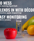 Indoor Fruit Fly Trap 4 Pack With 180 Day Food Based Lure, red apple-shaped trap with non-staining liquid bait, designed for kitchen use.