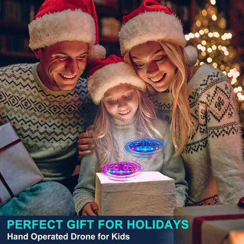 Family smiling with Hand Operated Flying Toy Drone For Kids With Gesture Control And 360 Degree Motion Sensors LED Lights