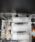 Close-up of capacitors in the Beefed Up 22 KW PTO Generator Package with 100 percent copper windings for jobsite power.