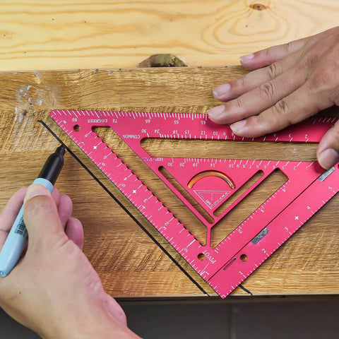 Hands using 7.5-Inch Magnetic Rafter Square With Jig Block Multi-Angle Measuring Tool For 90-Degree And 180-Degree Angles on wood