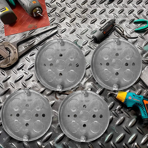 4-Pack Shallow Round Electrical Boxes For Ceiling Pancake Installations, 1/2-Inch Deep, 1/2-Inch Knockouts, 4-Inch Diameter in galvanized steel on a metal surface with tools
