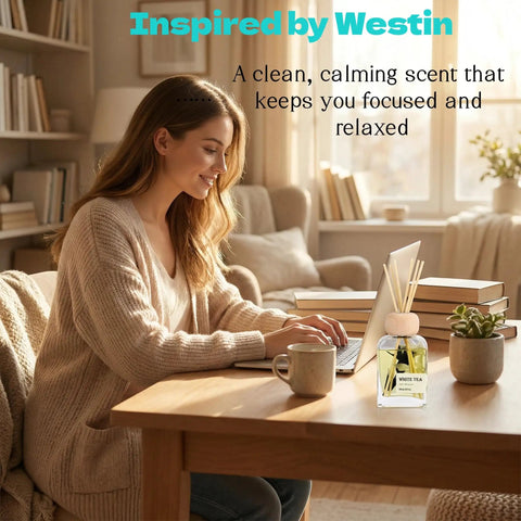 Woman working at desk with White Tea Reed Diffuser Set Inspired by Westin Hotel Scent for a 5 Star Home and Office Vibe, 3.34 Fl Oz