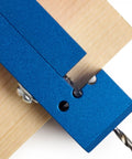 Blue aluminum Derby Car Drill Jig For Precise Axle Holes Create Straight Or 2.5 Degree Angled Holes And Raised Wheel Holes close-up