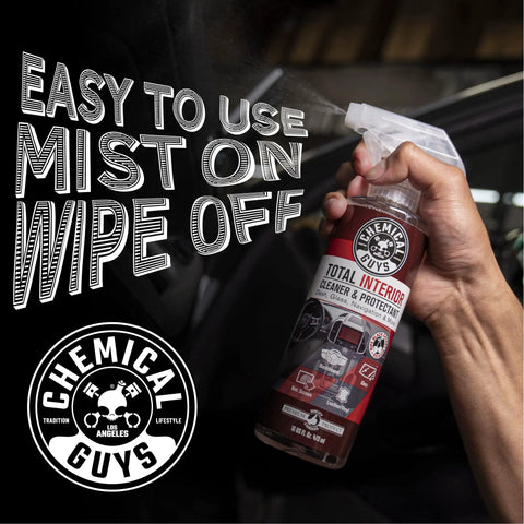 All In One Interior Cleaner And Protectant With Black Cherry Scent, 16 Oz, Safe On Leather, Vinyl, Plastic, Rubber And Glass, Cleans, Protects, And Refreshes Dash, Doors, And Panels For A Factory Clean Look And Fresh Car Vibe. spray bottle in hand