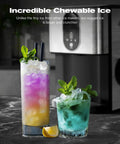 Countertop Nugget Ice Maker with 44 Lbs Per Day Output, two drinks made with pebble ice, kitchen setting, silver machine background