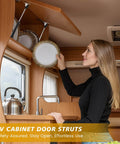 Woman using 30 Pack 10 Inch Gas Struts For Cabinets And Doors With Soft Open Pneumatic Lift For RV Boat Hatch Furniture Lids 100N 22.5lb
