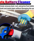 Upgrade Your Ride With This Slick 4 In 1 Auto Battery Terminal Cleaning Brush cleaning battery terminals with blue glove.