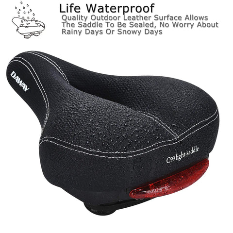 C99 Memory Foam Bike Seat Saddle With Taillight Waterproof Wide Leather Cushion shown with water droplets on surface