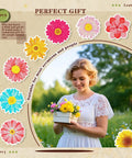 8Pc Flower Diamond Art Coasters Kit For Adults Beginners Women With Holder And Tools Includes 8 Round Diamond Painting Coasters Pen Glue Clay Plastic Trays Extra Gems For Fun DIY Home Decor showcasing floral designs with a person holding flowers.