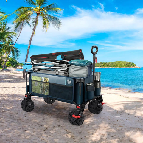 Beast Of A Heavy Duty Collapsible Wagon With Brakes For All Terrain Use, Handy Utility Cart For Shopping, Camping, Beach Or Garden, Big Storage, Side Bag And Cup Holders, Easy Fold, Blue on a beach