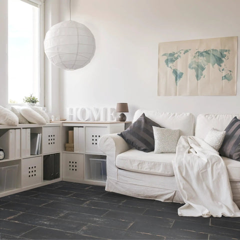 Living room with Retro Nero Porcelain Floor And Wall Tile 8.25 X 23.5 Inches glazed textured low sheen tiles on floor.