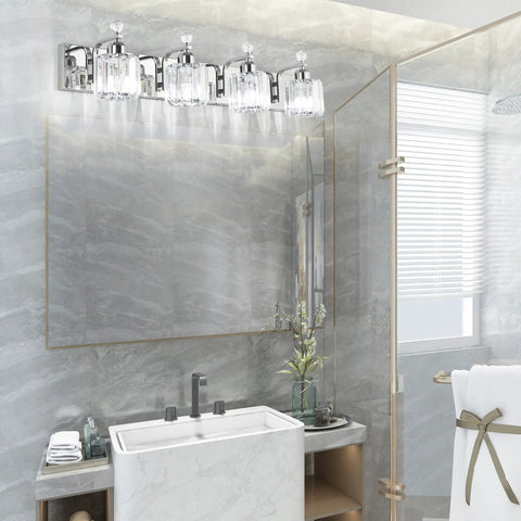 Chrome 4 Light Crystal Vanity Light Over Mirror With Dimmable E26 Sockets Modern Bathroom Lighting Upgrade Your Bath With Crystal Shine Glam Up Your Space Bulbs Not Included installed above a bathroom mirror, reflecting light on a marble wall.