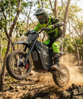 Rider on Powerful 4000W Electric Dirt Bike for Teens and Adults with 45 MPH peak speed navigating rocky terrain