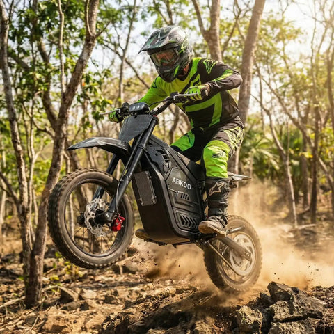Rider on Powerful 4000W Electric Dirt Bike for Teens and Adults with 45 MPH peak speed navigating rocky terrain