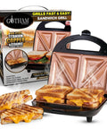Gotham Steel Nonstick Panini Press And Sandwich Maker Grill With Indicator Light cooking two grilled cheese sandwiches.