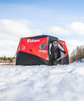 Heavy Duty Pop Up Insulated Ice Fishing Shelter With Knockout Spacious Fishin Spot For Five To Seven Crews, setup in snow.