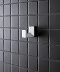 Selection Cube Robe Hook in Starlight Chrome on black tiled wall