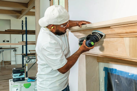 Person using Granat Profile Delta Sanding Pads Set Of 10 With Flexible Foam Backing For Curves And Corners on wooden surface