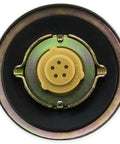 Top view of Gas Tank Cap Replacement Fits Ford F 150 75 76 F 100 53 76 F 250 53 76 F 350 53 74 Econoline 69 74 Chevy P30 75 78 Scout II 76 80 Plymouth Barracuda 70 D4TZ9030B Easy Install Gas Cap For Older Rigs And Vans showing sealing mechanism.