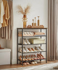 Solid Multi Tier Shoe Rack Storage Organizer Holds Twelve To Sixteen Pairs With Reinforced Steel Frame And Durable Fabric Shelves displaying shoes in entryway.