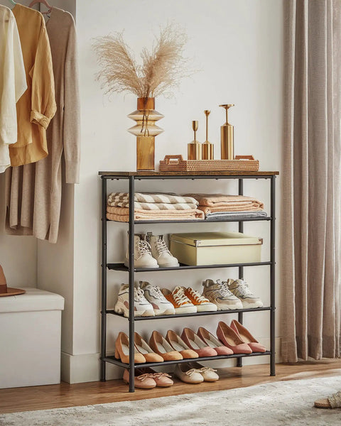 Solid Multi Tier Shoe Rack Storage Organizer Holds Twelve To Sixteen Pairs With Reinforced Steel Frame And Durable Fabric Shelves displaying shoes in entryway.