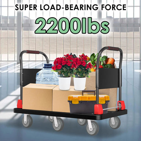 Heavy Duty 2200 Lb Platform Truck With Six Smooth Glide Wheels And Foldable Dual Handrails For Hauling Construction Tools And Warehouse Stock Without Breaking A Sweat, loaded with boxes and plants.