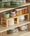 Heavy Duty Bamboo Cabinet Organizer Shelf Two Pack Stackable Kitchen Counter Rack Featuring Slatted Draining Surface To Air Out Dishes And Keep Counters Squeaky Clean with bowls and jars stacked.