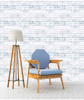 Room with DIY Ready Peel And Stick Shiplap Wallpaper In Light Grey White Distressed Wood Plank Look With Grid Backing, chair, lamp
