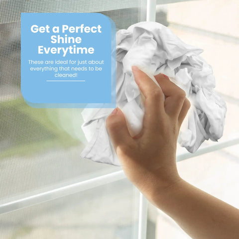 Hand using White Knit Wiping Cloths For Painting Staining And Cleaning on window, smooth white rags for finishing, DIY projects.