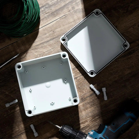 Outdoor Electrical Junction Box 6x6x3 Inches Waterproof IP65 Dustproof ABS Plastic Enclosure in gray-white, with lid and screws visible.