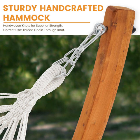 Close-up of Two Person Cotton Fabric Hammock With Spreader Bars And 10.5 Ft Wood Arc Stand showing handwoven knots on wooden stand.