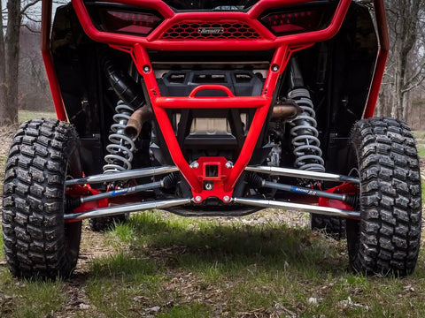 Beefed Up Billet Aluminum Rear Radius Arms For Polaris RZR XP 1000 And XP 4 1000 Models, 1-1/4 Inch 7075 Solid Aluminum Bar Upgrade Over OEM 3/4 Inch, heavy-duty rear suspension arms shown on red RZR