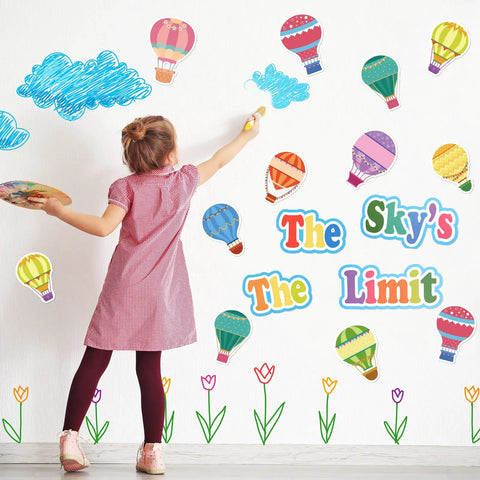 Girl arranging 68 Pcs Hot Air Balloon Classroom Bulletin Board Decorations Kit For Back To School, Inspirational Quote Cutouts