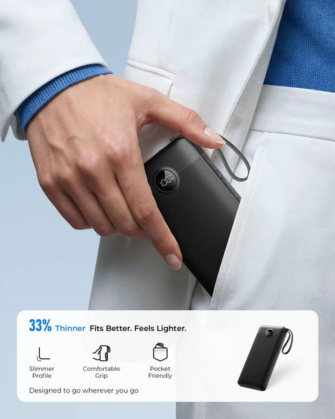 Hand holding the Total Game Changer Portable Charger With Four Built In Cables And Massive Twenty Thousand Mah Fast Charging Power Bank for easy storage.