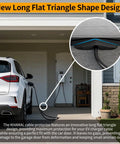 EV Charger Cable Protector For Garage Door Pass Through with long flat triangle design under a Tesla in a driveway